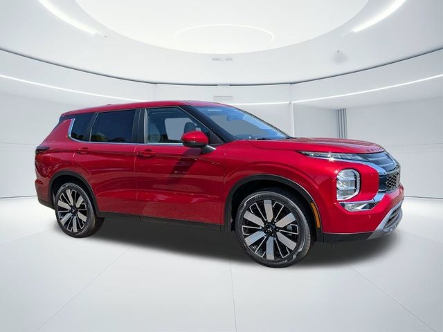 2026 Mitsubishi Outlander SE in Red — front three-quarter view